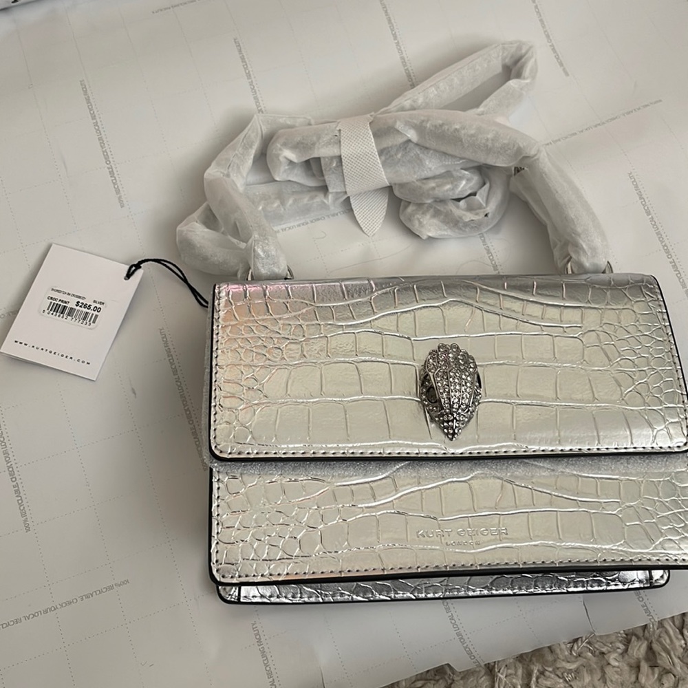 Brand new silver Kurt Geiger Purse with tags over 50% off!